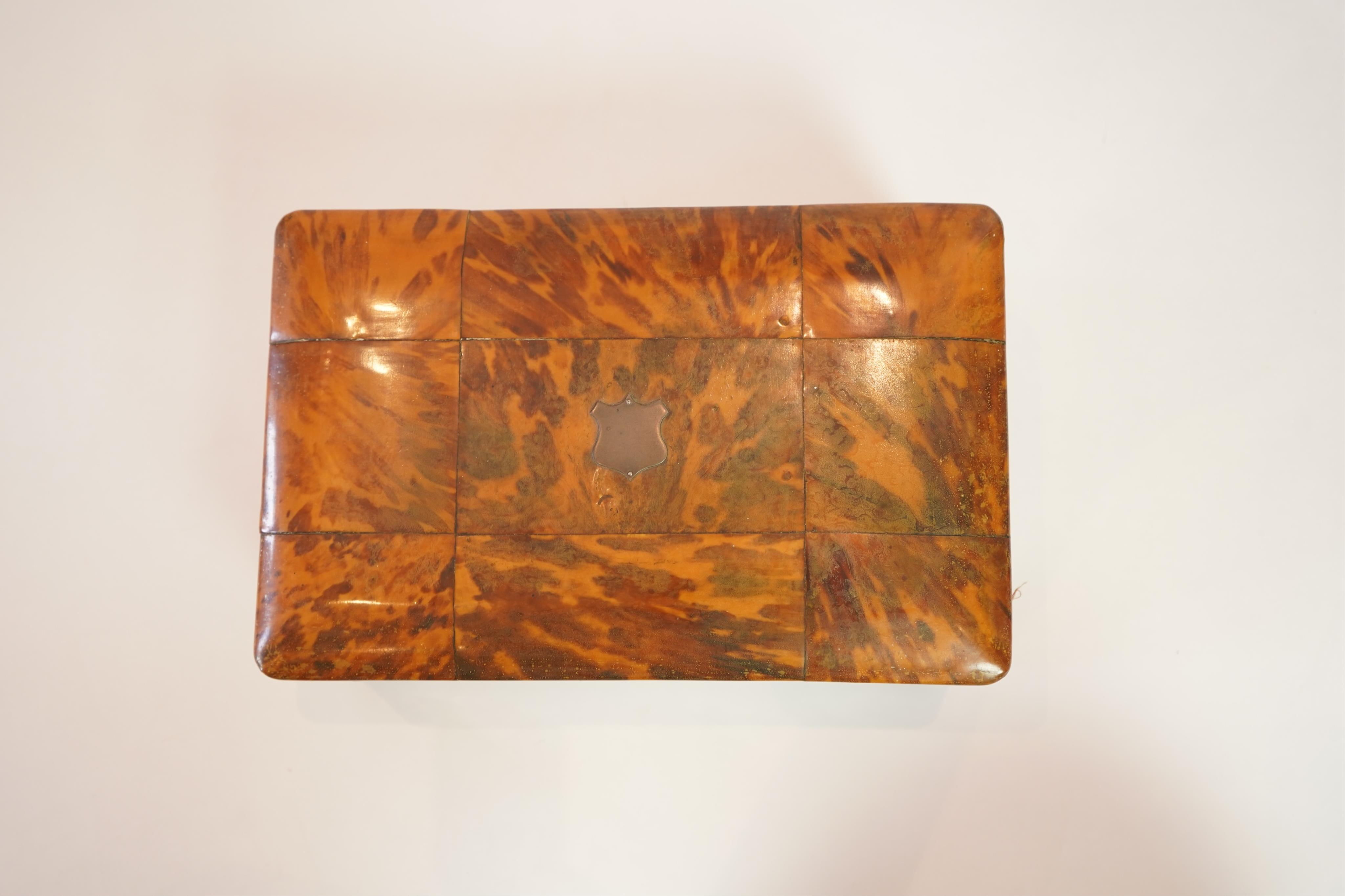 An early 19th century blonde tortoiseshell work box